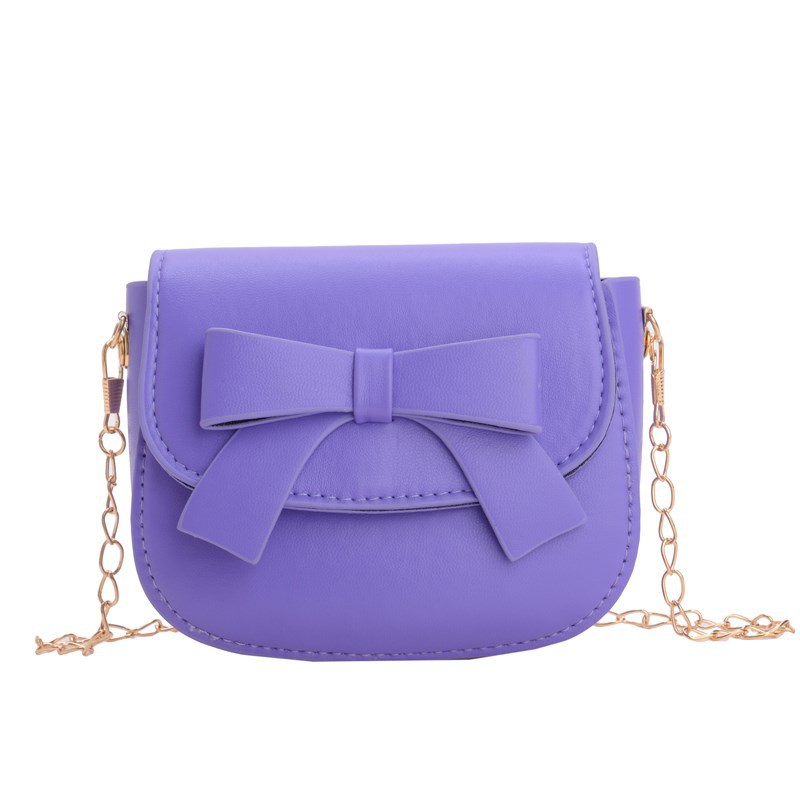 Bolsos de hombro de princesa de color sólido mini lindos bolsos de arco para niñas 2025 nuevos bolsos de cadenas para niños
