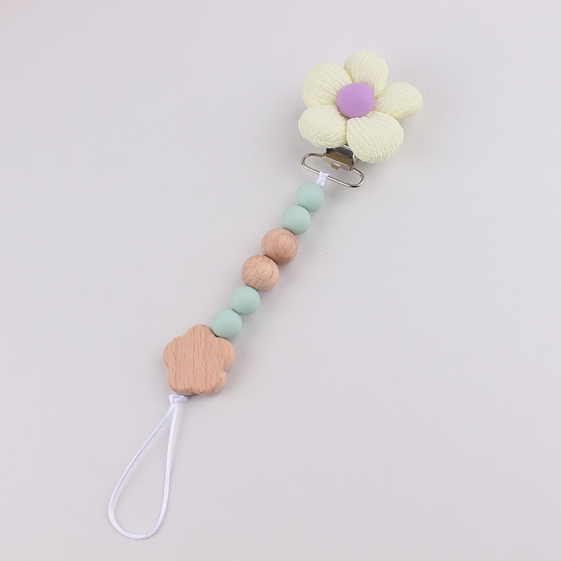 Productos para bebés pacificadores de tetas anti-caída cadena INS cadena de diente de viento flor de madera