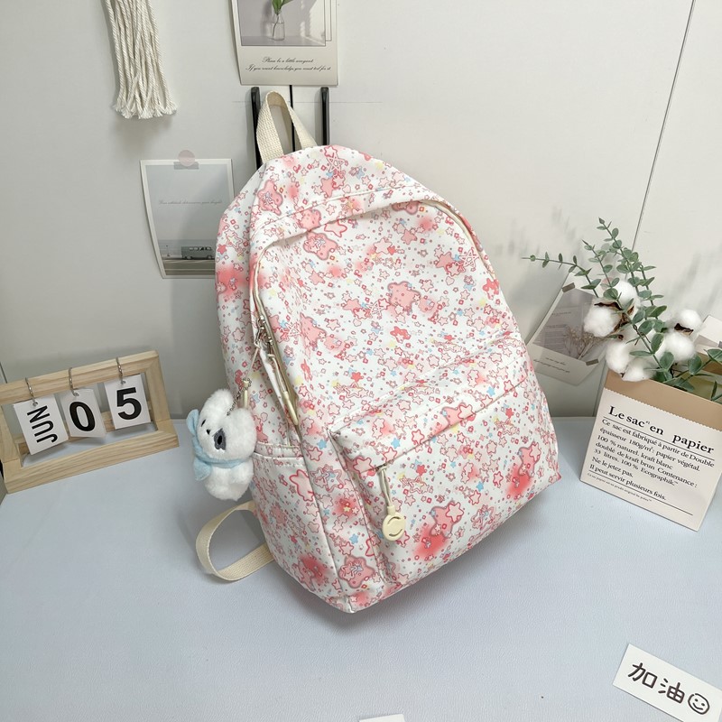 Mochila de estudiantes de alto valor de diseño de tendencia impresa de gran capacidad mochila de flores pequeñas estrellas mochila para mujeres image 9