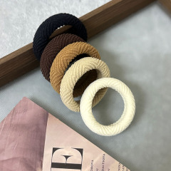 新商品のミルクカレー色の高弾力耐久性のある皮筋シンプルな雰囲気の高馬尾髪ひも
