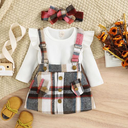 Baoxin children's clothing foreign trade Korean version autumn and winter pit strip top bow flying sleeves plaid suspender skirt girls two-piece suit