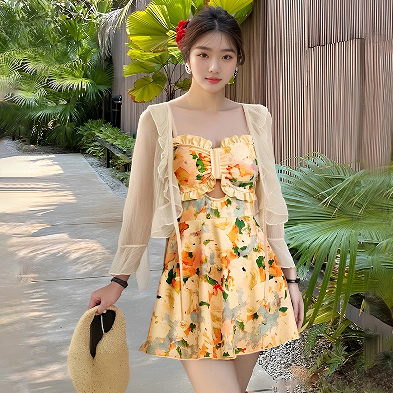 2025 verano nuevo estilo francés ligeramente gordo y delgado traje de baño floral de una pieza falda de mujer blusa de manga larga traje de baño al por mayor