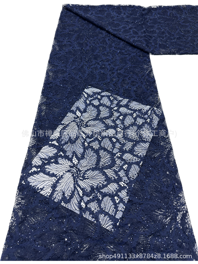 Nuevo hueco flor de encaje fondo tela de perforación caliente pesada cola de pez vestido de boda vestido de noche brindis tela spot