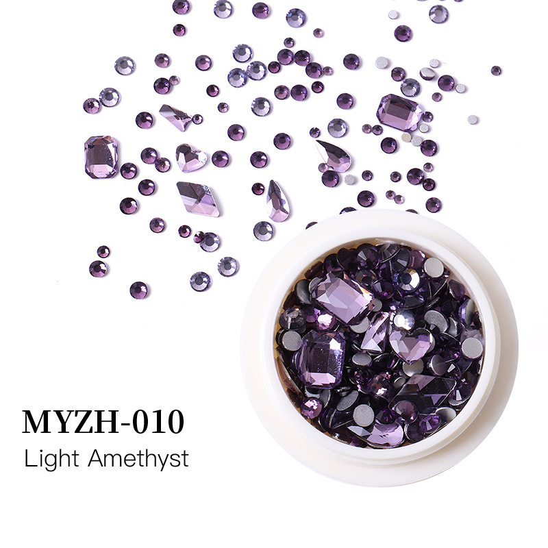 Accesorios de uñas transfronterizos mezclados al por mayor caja redonda de vidrio plano especial en forma de diamante taladro de uñas paquete de material de taladro de uñas al por mayor