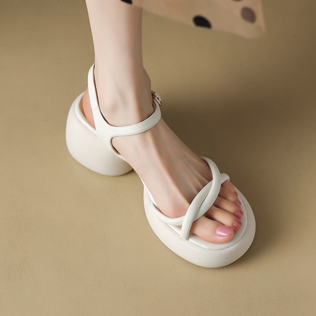 Small summer sandals platform with a strap