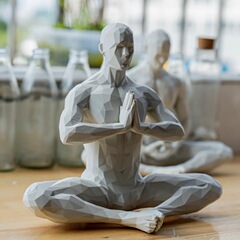 国境を越えた新製品Meditating man seriesが座っている男の小さな置物のリビング装飾品