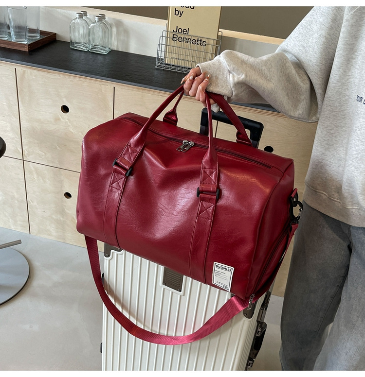 Men's high-end travel bag, large-capacity sports and fitness bag, women's leather travel clothes, luggage bag for men undefined