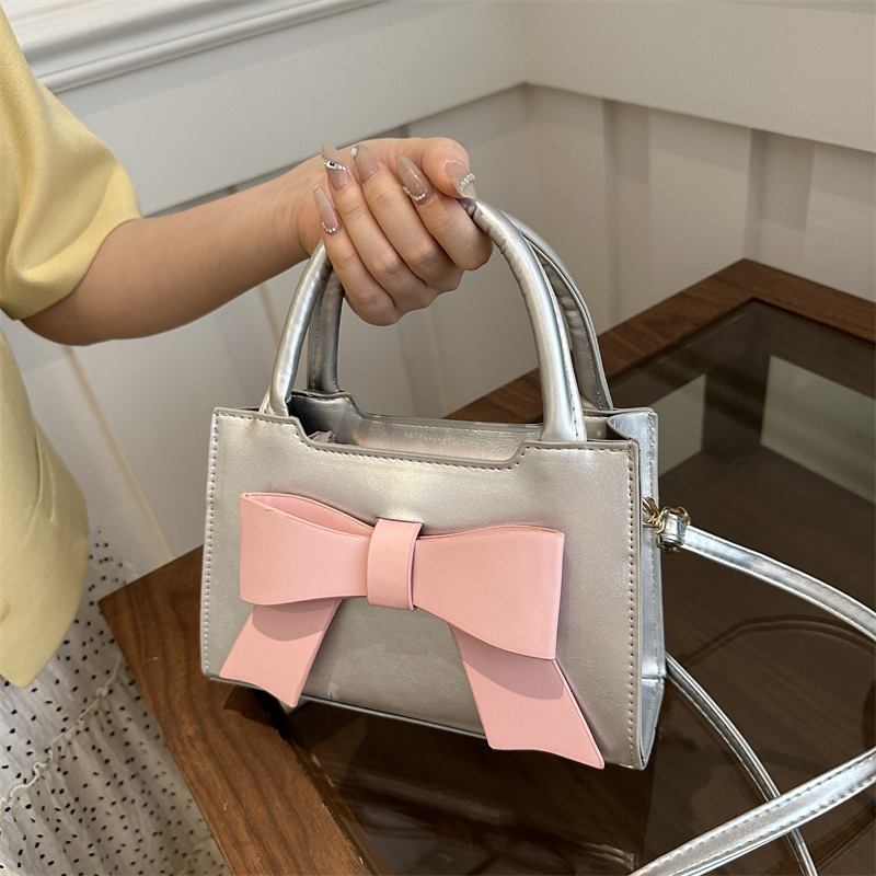 Bolso de moda coreano para mujeres 2024 nuevo arco de viento dulce bolso pequeño nicho bolso de hombro