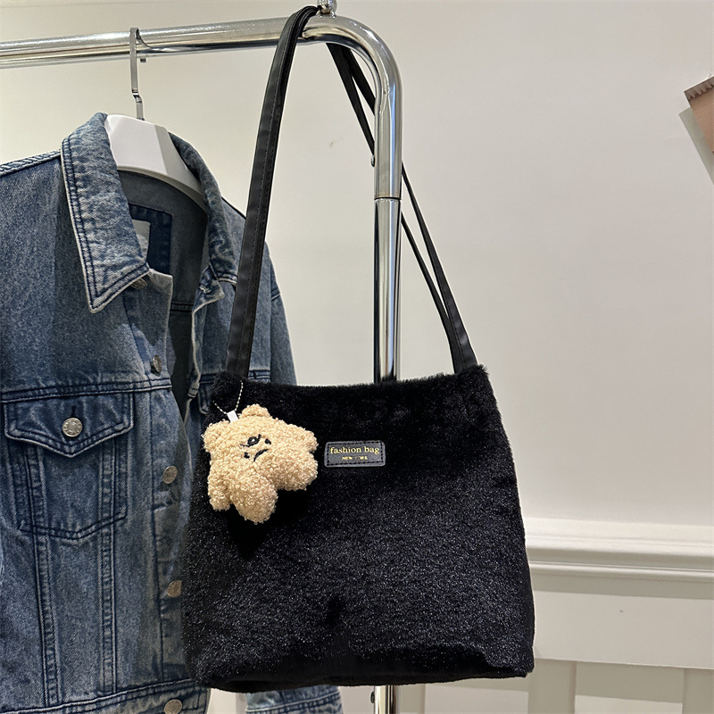 Bolso de felpa de moda de otoño e invierno para mujer 2025 casual todo-fósforo bolso de viaje de gran capacidad textura bolso de hombro