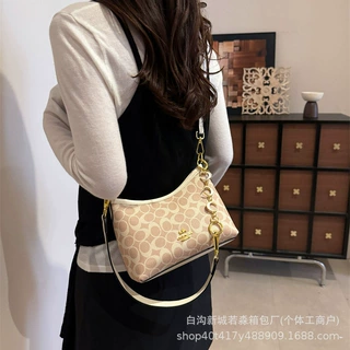 包包女通勤腋下托特包2026新款印花复古上班族单肩斜挎包女批发