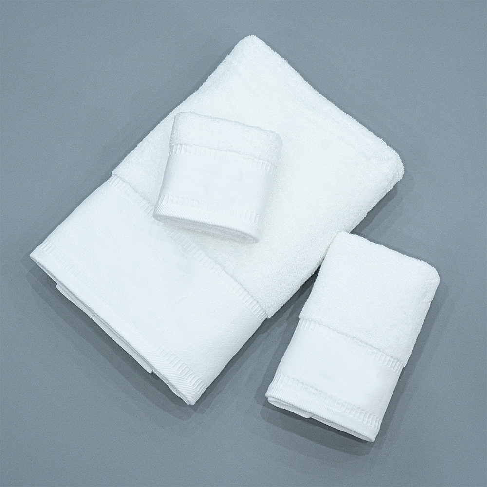 Toalla de hotel algodón engrosado Hotel salón de belleza B & B regalo de alta gama logotipo bordado Toalla de hotel Toalla de baño traje