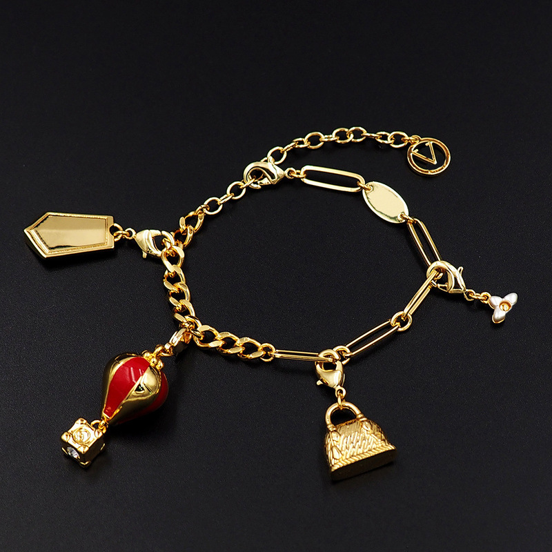 Wholesale Asian Gold Jewelry V Letter Shield Bag Pearl Flower Hot Air Balloon Bracelet Flower 4 Pendant Bracelet Wholesale Asian Gold Jewelry V Letter Shield Bag Pearl Flower Hot Air Balloon Bracelet Flower 4 Pendant Bracelet