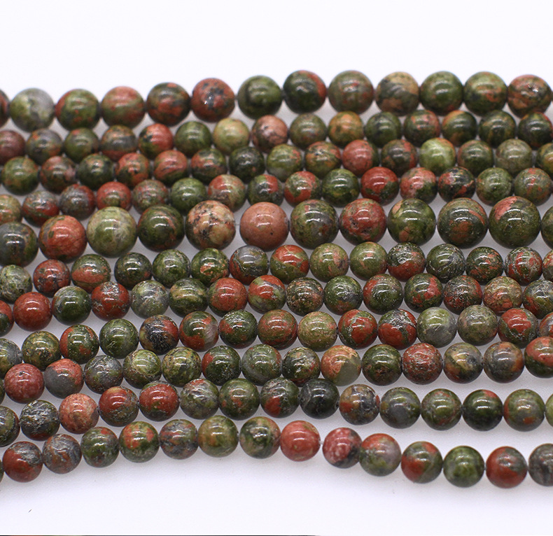 Los fabricantes suministran directamente collares de pulsera de cuentas dispersas de cuentas redondas de esmeralda natural DIY joyas semiacabadas al por mayor