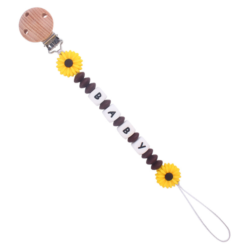 Nuevo bebé suministros de dibujos animados margarita teether creativo bebé DIY mordedura molar pezón cadena anti-gota cadena