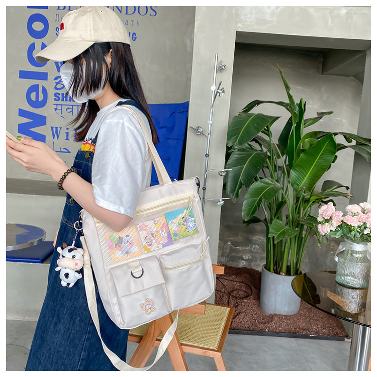 Large-capacity Japanese-style single-shoulder canvas bag for girls, versatile crossbody, ins, a tote bag for junior high school students' classes, and a schoolbag for after-school tutoring undefined