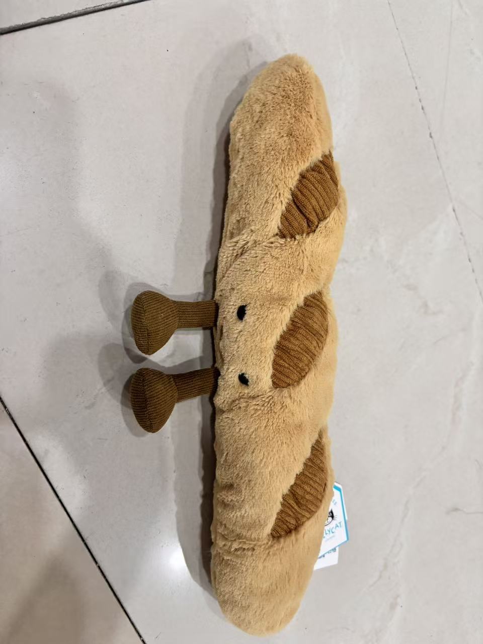 元のイギリスジェリーcatシリーズのぬいぐるみの超全合集3b斉防塵袋のバーゼル熊の手の花