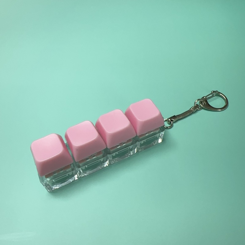 クロスボーダー一字型四ボタンは純色のボタンを押して軸を解凍します。|undefined