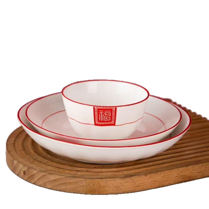 Serie de tallas de color esmalte de Año Nuevo Celebrado cubiertos de cerámica china rojos platos de platos de arroz caseros