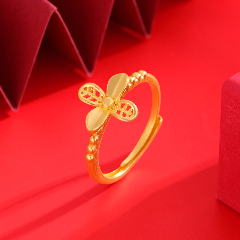 Nuevo anillo de oro de vietnam hoja de ginkgo femenina flor de cuatro hojas hueco ajustable anillo de oro de imitación todo fósforo joyería de estilo nacional