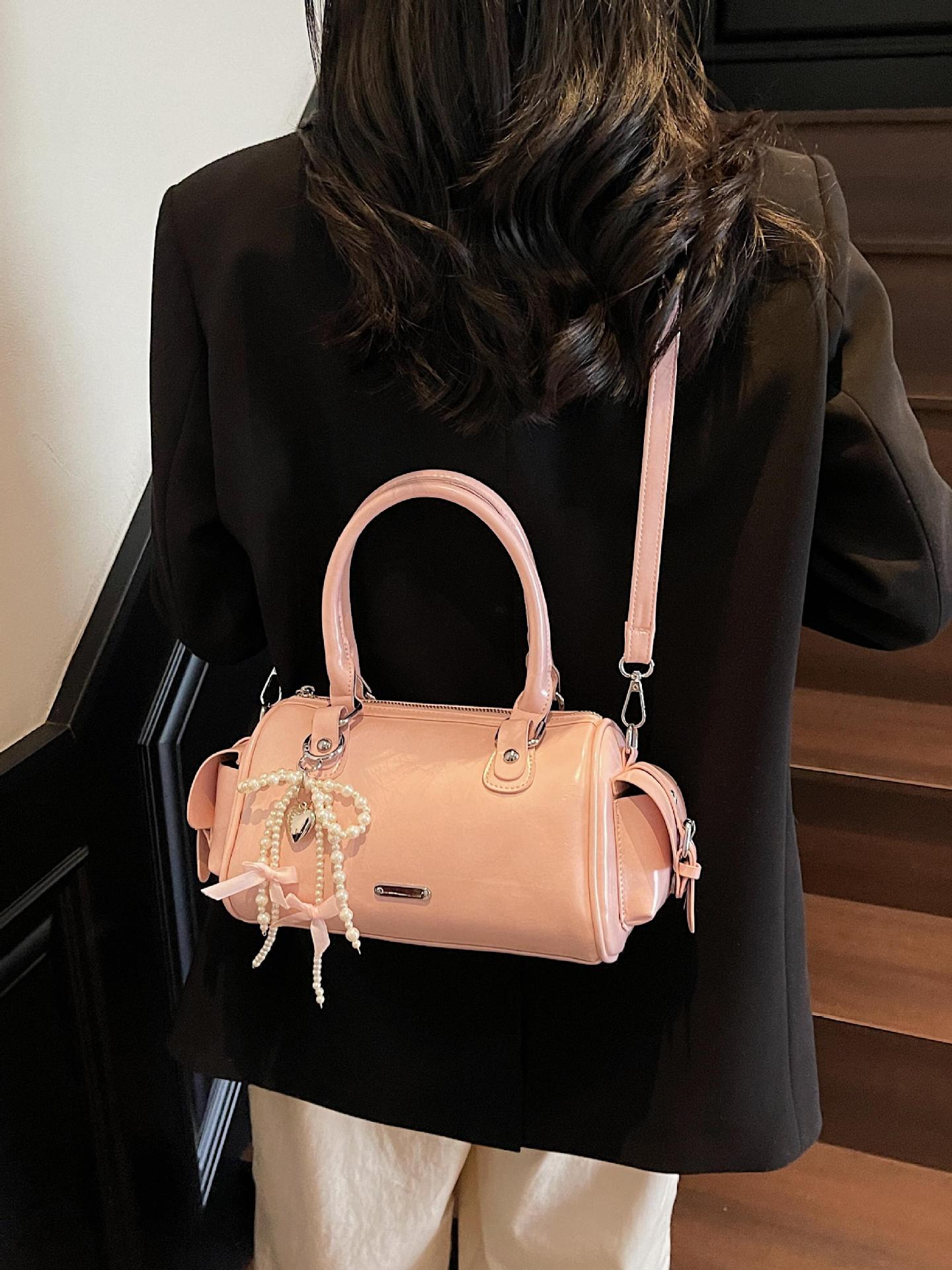 Versión coreana del bolso pequeño de mano súper caliente para mujer 2025 nuevo bolso de hombro de diseño de nicho bolso de mensajero popular de verano