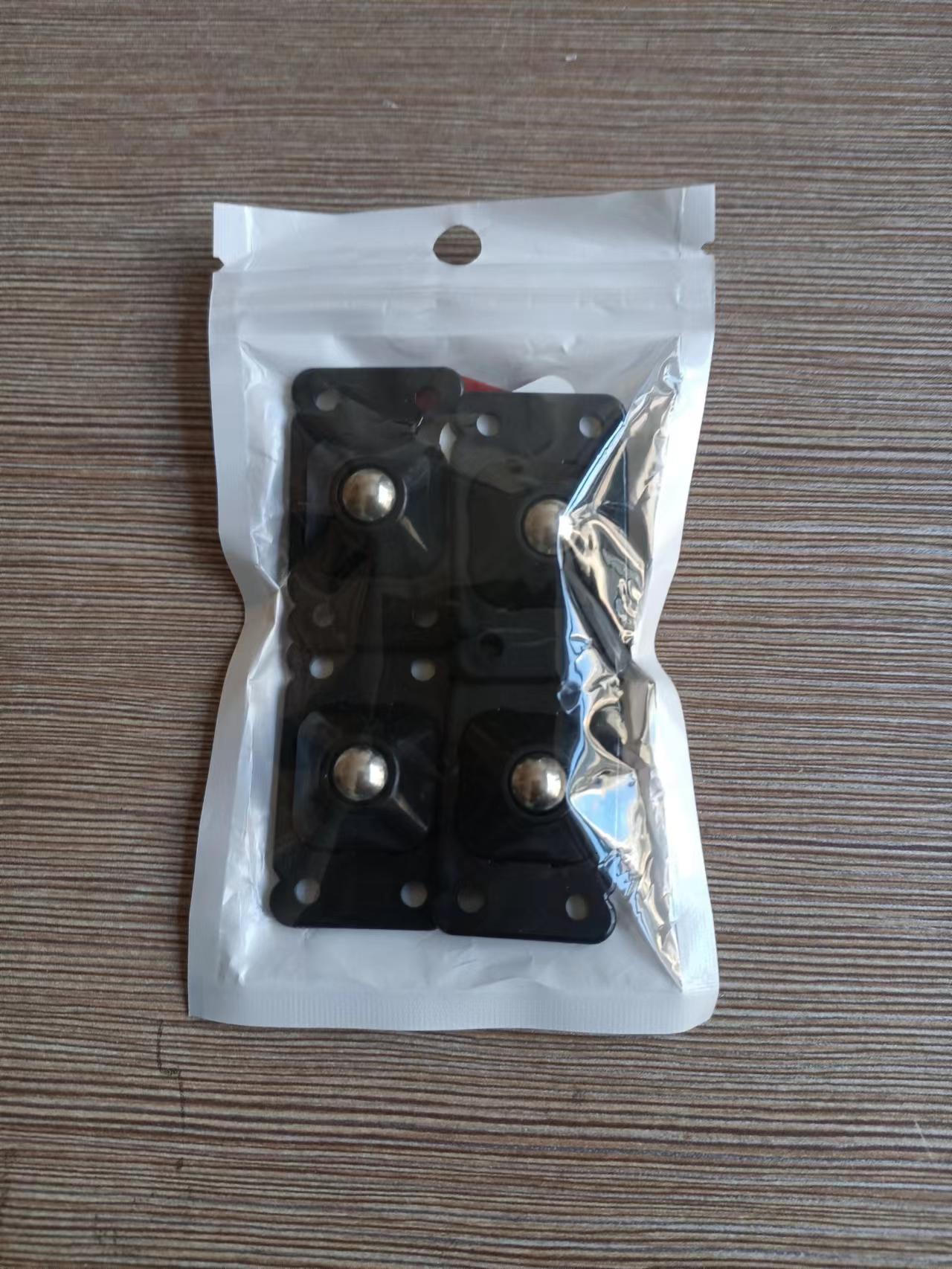 Plástico universal rueda de almacenamiento rack pequeña rueda deslizante caja de almacenamiento rodillo adhesivo pequeña polea fábrica al por mayor