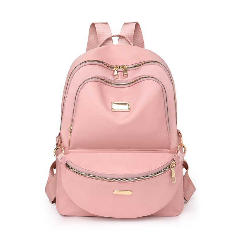 Fábrica al por mayor 2024 nueva mochila de nailon casual para mujer, mochila para madre y niño de viaje urbano de todo fósforo de moda