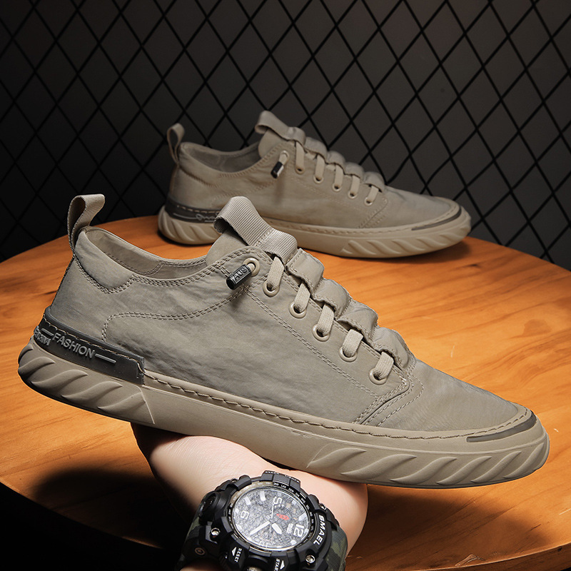 Primavera nueva seda de hielo transpirable viejos zapatos de tela de Beijing estilo coreano zapatos de moda universal zapatos de lona casuales para hombres