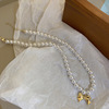 Fashionable necklace from pearl with bow, design universal chain for key bag , trend of season, simple and elegant design, wholesale