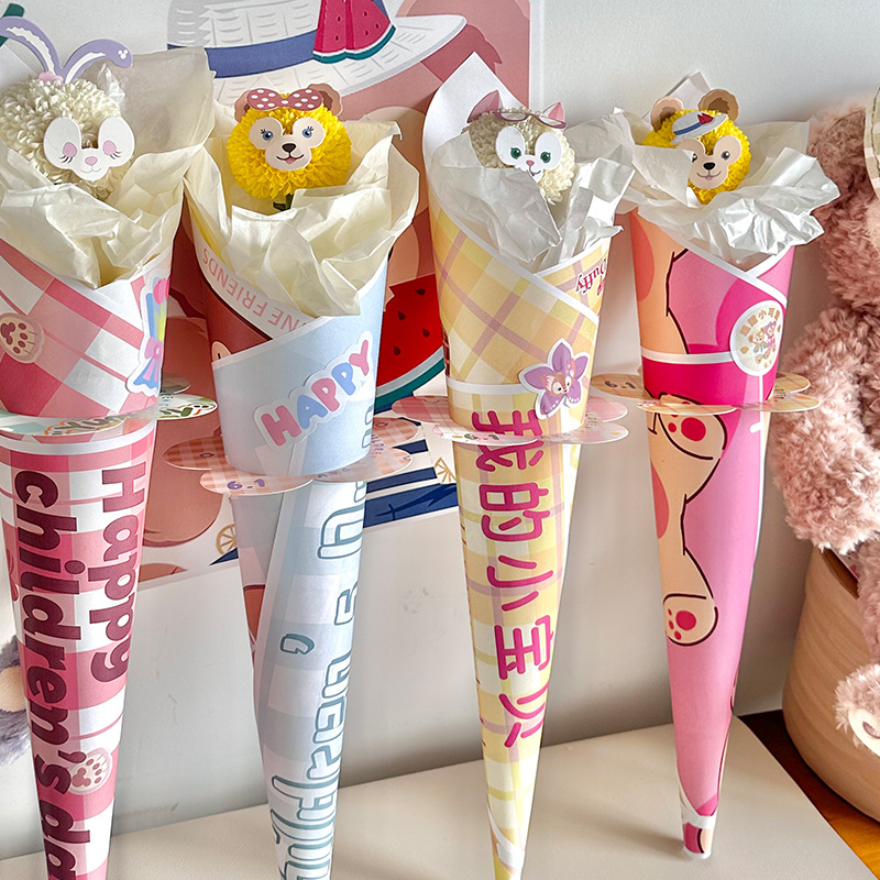 六一儿童节包装纸花束礼盒抱桶包花纸玩偶工资卡通图案包装纸批发