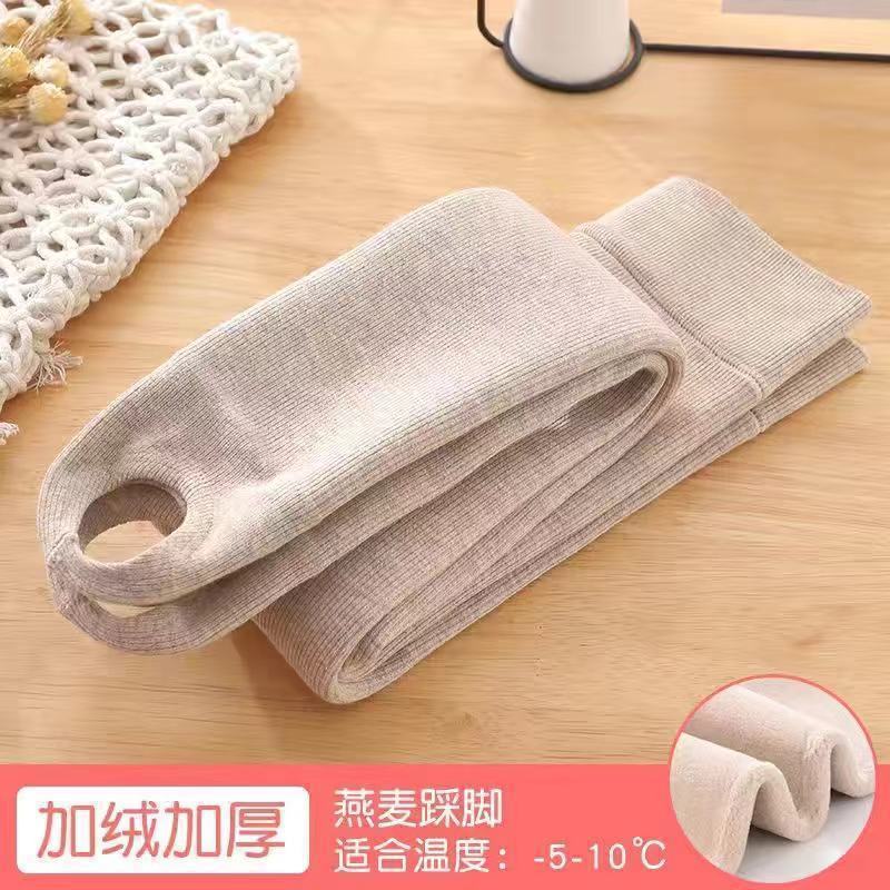 女の子の一体の毛の底のズボンとベルベットの厚い秋冬の大きい子供の縦の条のズボンの靴下の赤ちゃんの厚い毛の外は洋風を着ます。