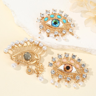European and American trend alloy rhinestone pendant devil's eye brooch versatile exaggerated women's clothing corsage jewelry pin