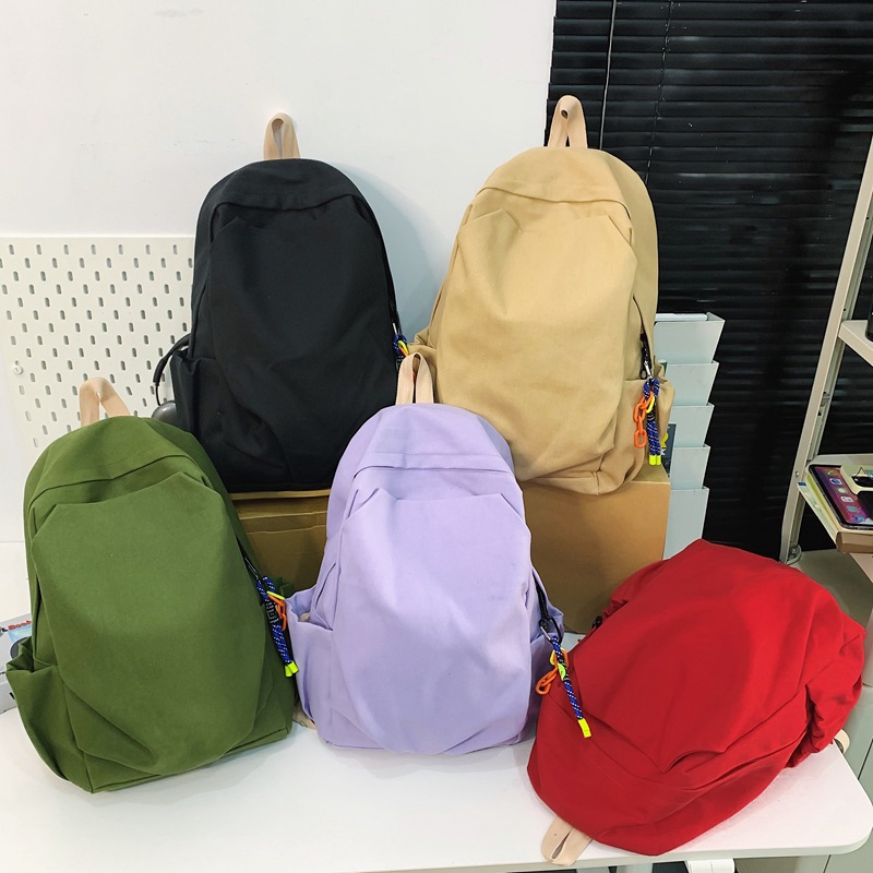 书包女休闲复古耐磨帆布双肩包男女日系大学生简约百搭旅行背包男