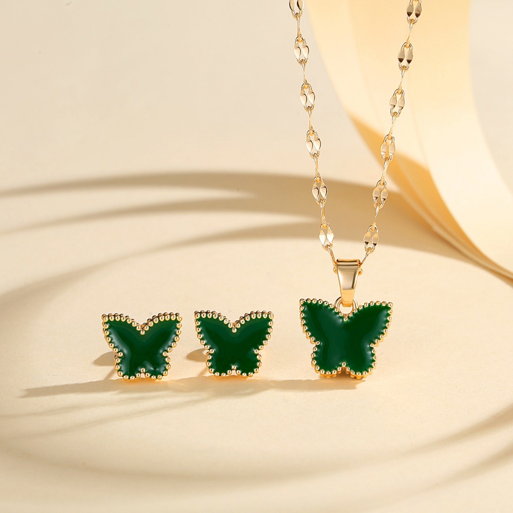 Europa y los Estados Unidos explotaron mariposa juegos de joyería de cobre dorado para mujeres pendientes de aceite goteo collar de seis colores joyerías transfronterizas en caliente