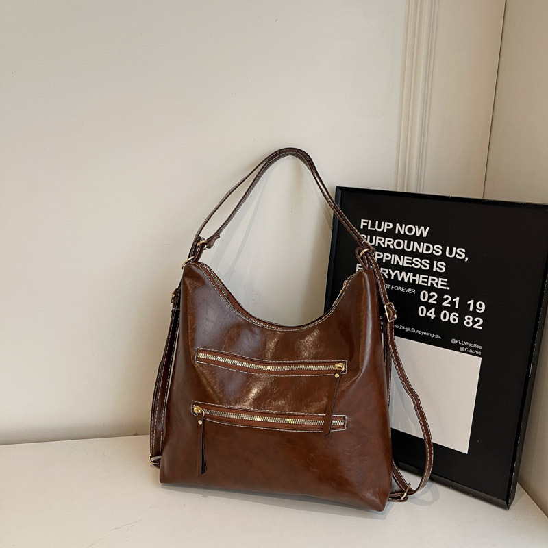 Casual viaje retro bolsos de mujer 2025 nuevo otoño invierno de alta capacidad sensación de hombro mochila bolsa