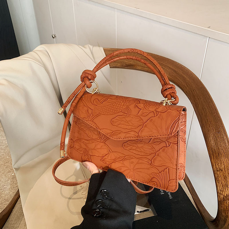 Nuevo estilo de ocio extranjero 2025 primavera de moda simple bolso de hombro flor tridimensional bolso de mochila