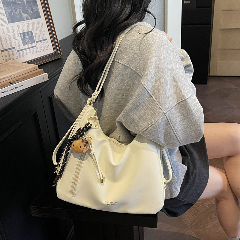 韩版简约复古风时尚单肩包百搭新款两用双肩包通勤小众手提斜挎包