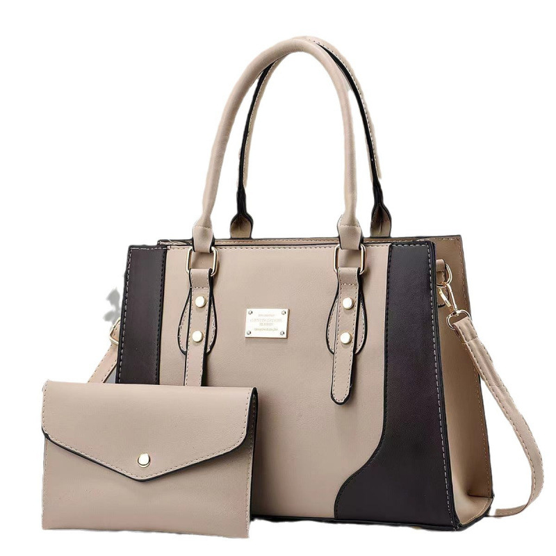 Dos paquetes de bolsas de niños 2025 moda nueva mujer mochila de hombro bolsas de mano versátiles bolsas transfronterizas