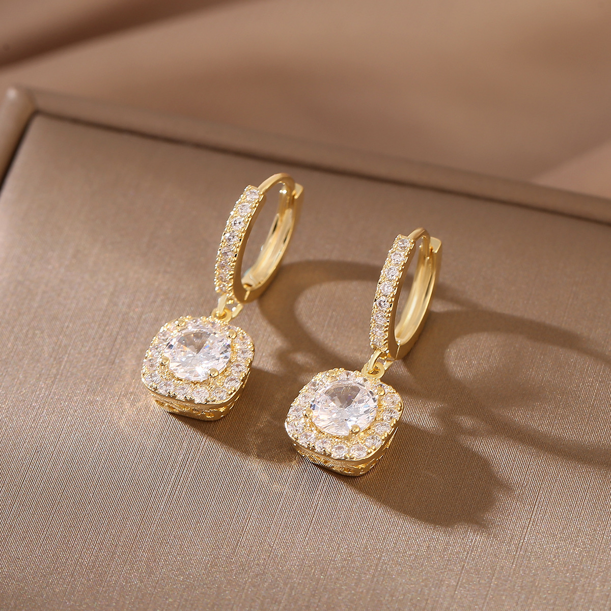 Copper fashionable earrings with zircon