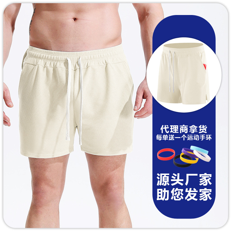 Pantalones cortos deportivos de waffle para hombres correr fútbol fitness deportes de secado rápido transpirable cómodos pantalones sueltos de cuartos delgados