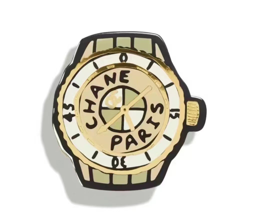 Green dial, brooch