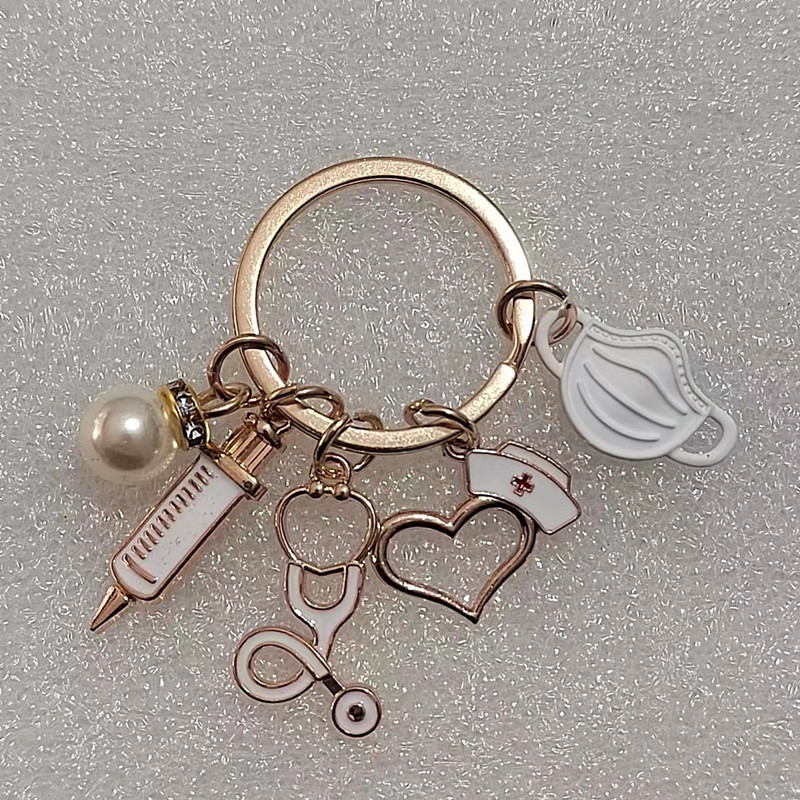 Llavero médico nuevo transfronterizo enfermera doctor jeringa estetoscopio personal