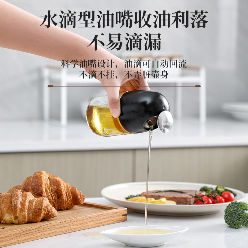 La nueva olla de aceite de vidrio de apertura y cierre automático, botella de condimento de cocina para el hogar, mayor capacidad, boquilla de aceite en forma de gota, tanque de vinagre de salsa de soja