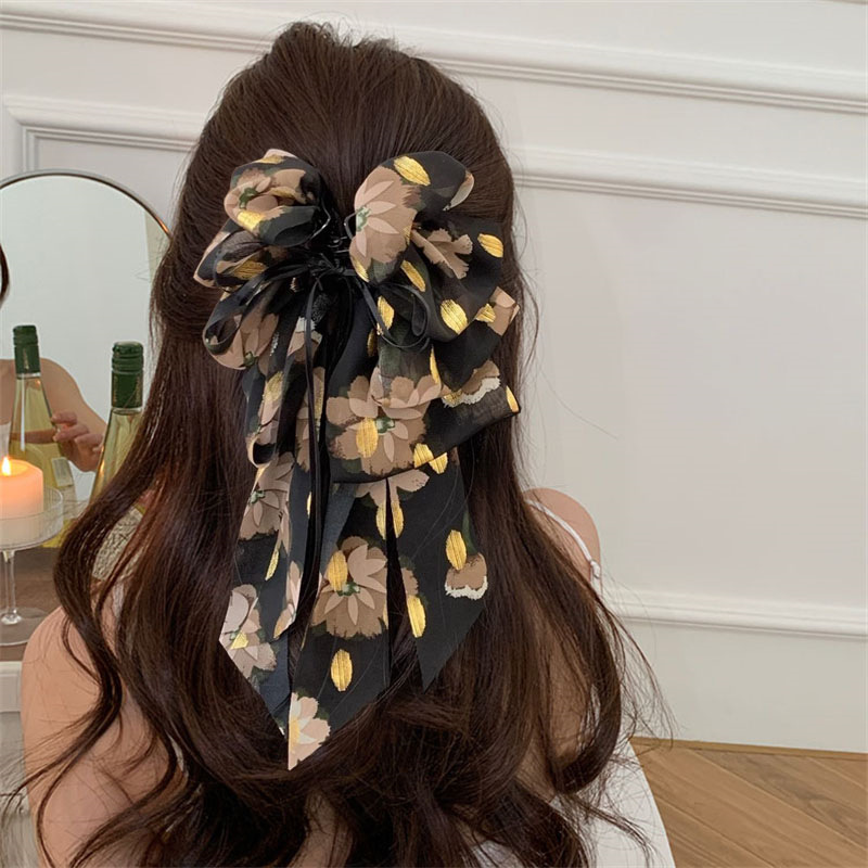 Nuevo estilo francés retro floral bowknot cola de caballo pinza de agarre temperamento ambiente de alto nivel sentido horquilla en la parte posterior de la cabeza