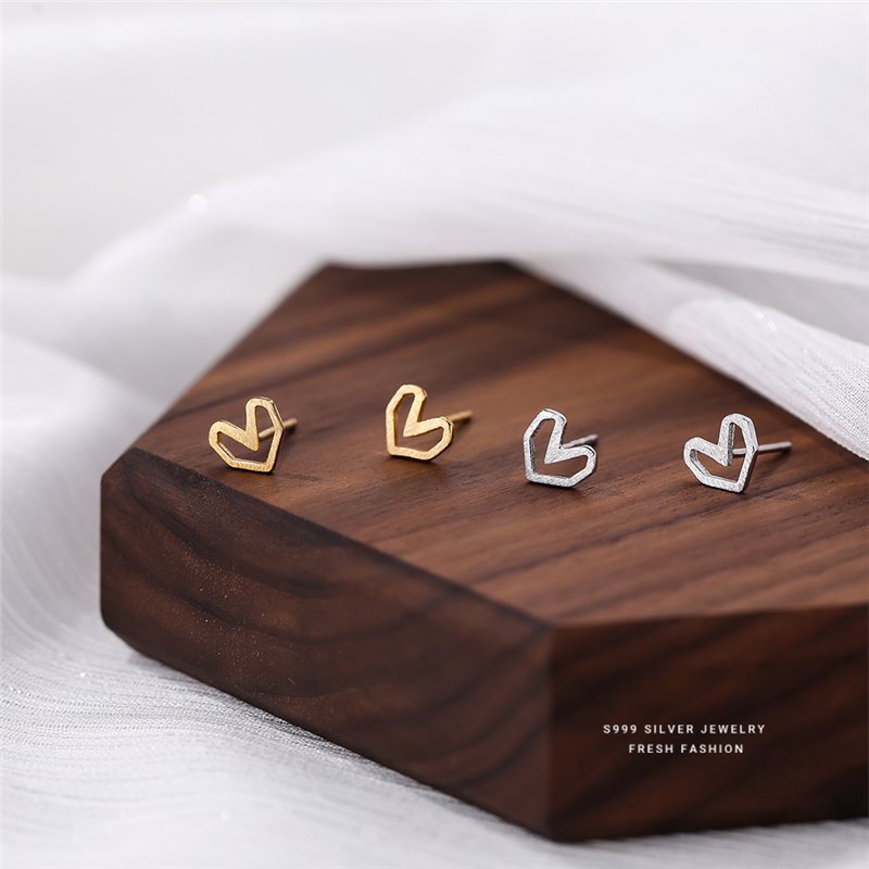 S999 a forma di cuore geometrico cavo per donna, semplice temperamento spazzolato fatto a mano, argento versatile e orecchini_voghion.com