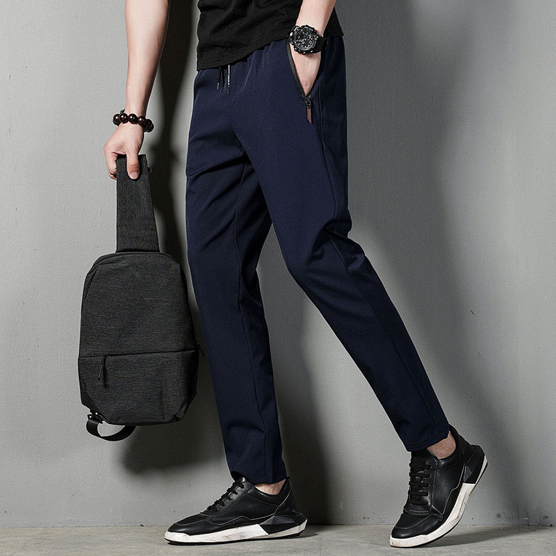 Men's autumn solid sports elastic casual trousers with zipper
