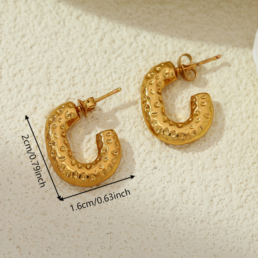 Europa y los Estados Unidos de moda transfronteriza alta sensación de textura elíptica de tendencia 18K acero inoxidable para mujeres brillante pernos de orejas mujeres al por mayor