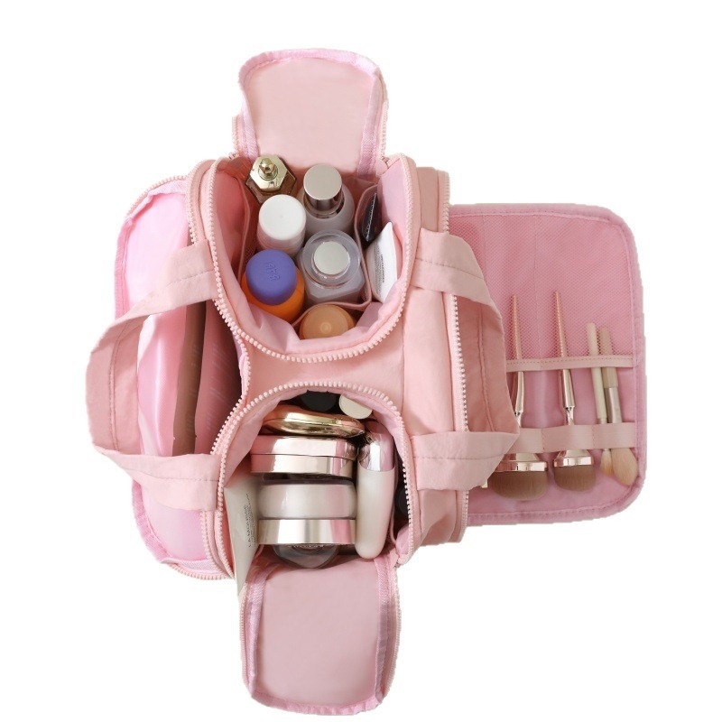Almacenamiento de partición de bolsa de cosméticos de gran capacidad portátil pequeña y ligera mujer 2025 nueva bolsa de almacenamiento de viaje de alto valor