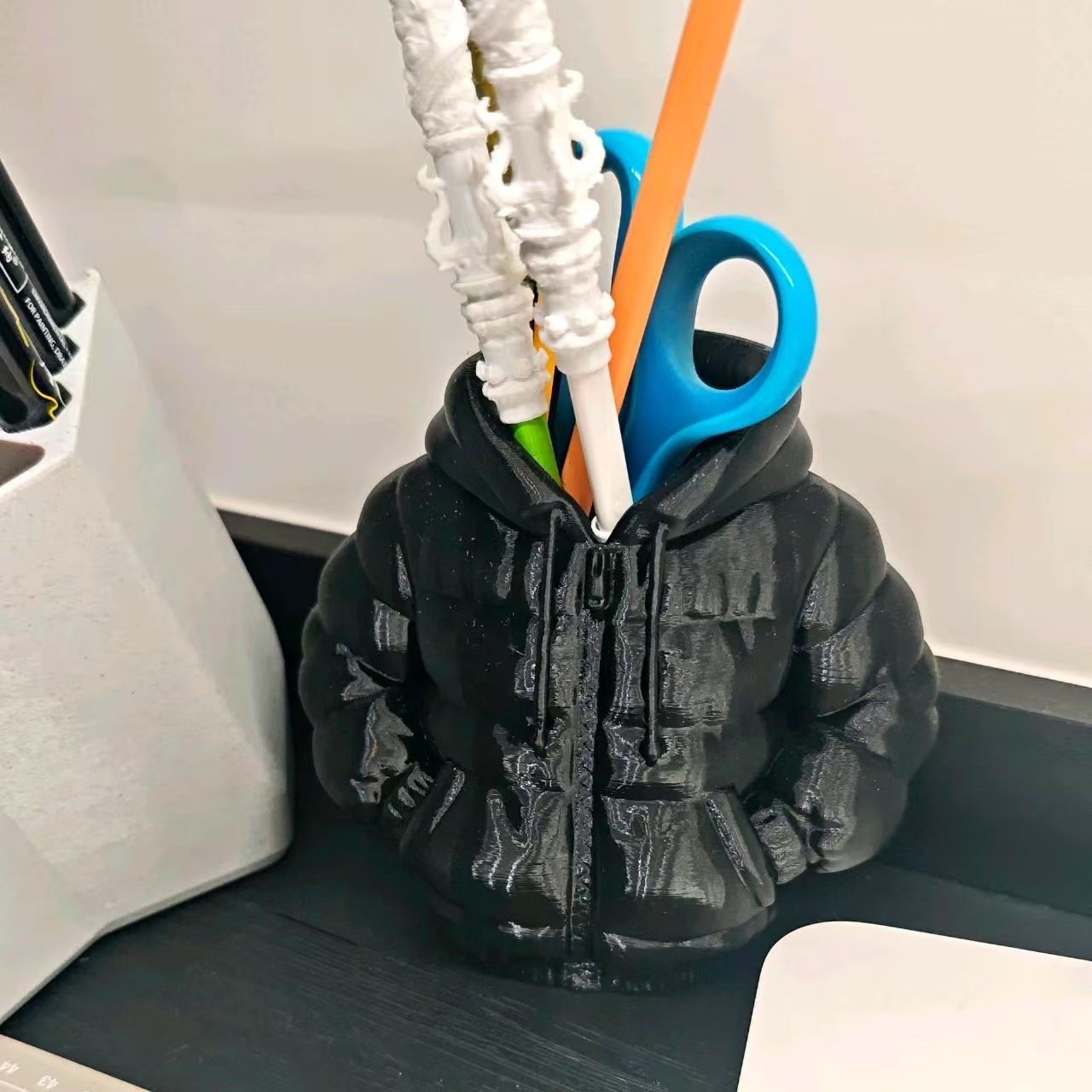 Down jacket, pens holder