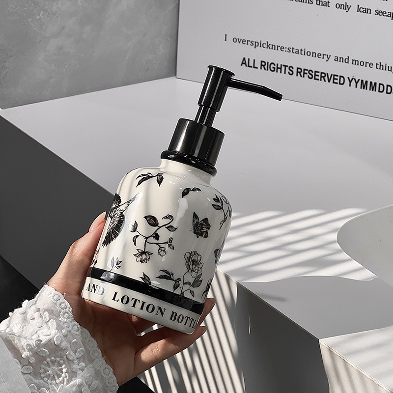Botella de cerámica medieval botella de diseño flor y pájaro botella de loción de textura excelente botella de diseño de hotel residencial botella de desinfectante para manos