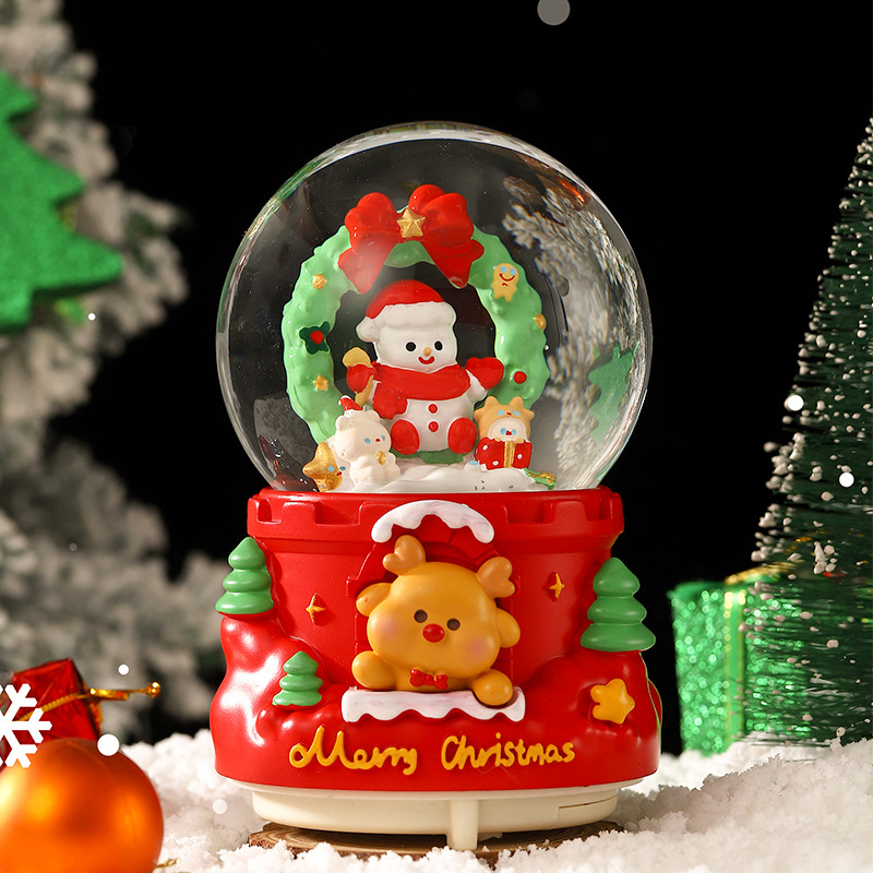 Una variedad de regalos de decoración de Navidad Navidad iluminante bola de cristal caja de música ventana diseño de velas lámparas de viento árbol de Navidad